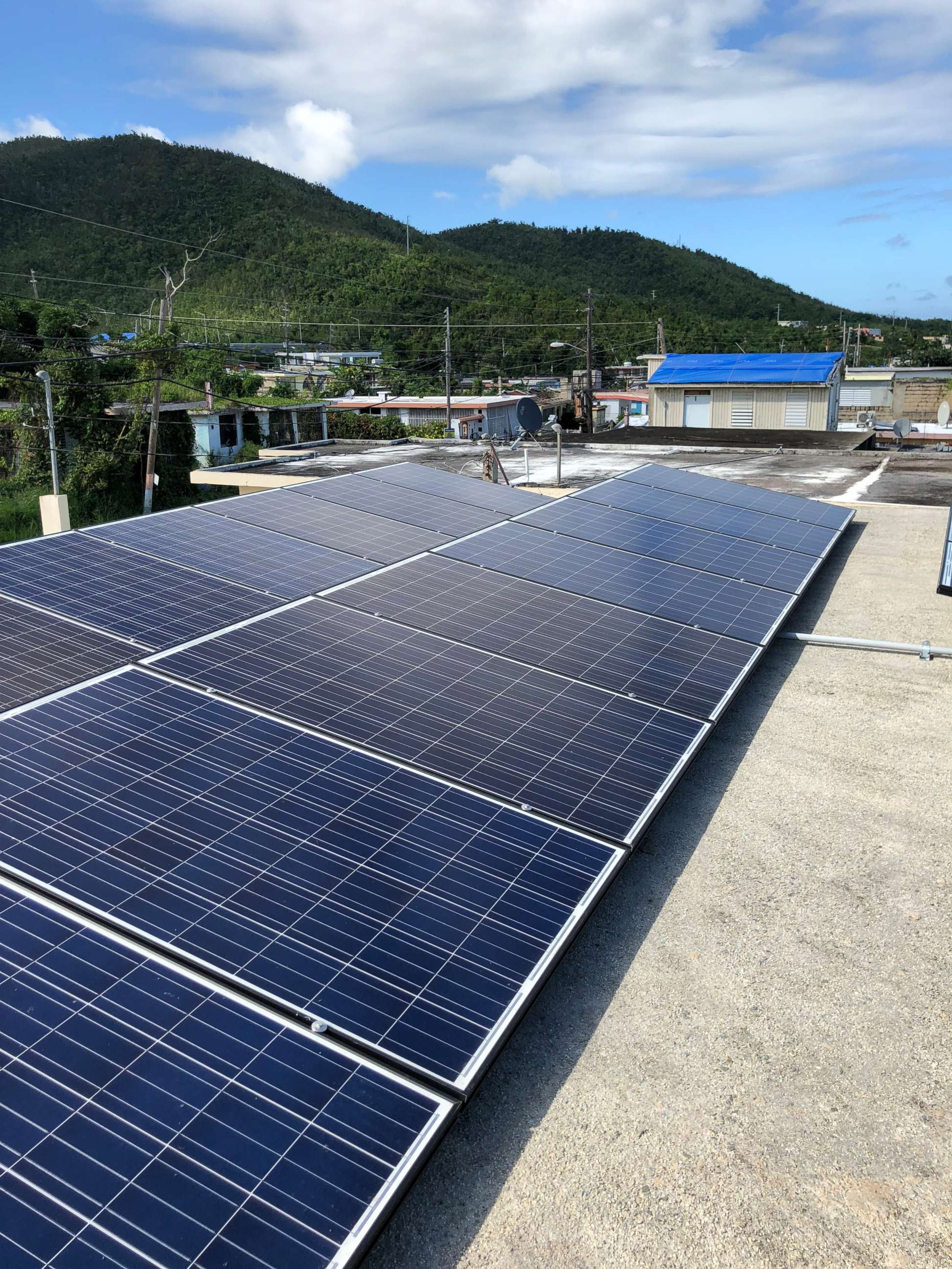 Solar panels atop a community organization building in Daguao, Puerto Rico.