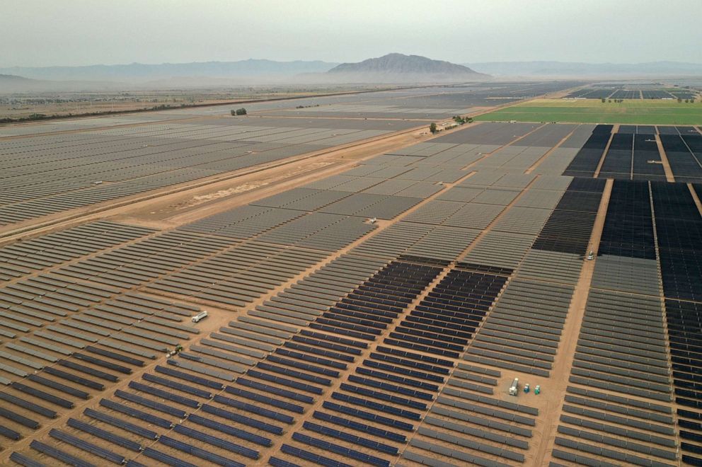 PHOTO: Smoke from wildfires is seen past photovoltaic panels at the Calexico Solar Farm II in this aerial photograph taken over Calexico, Calif., Sept. 11, 2020.