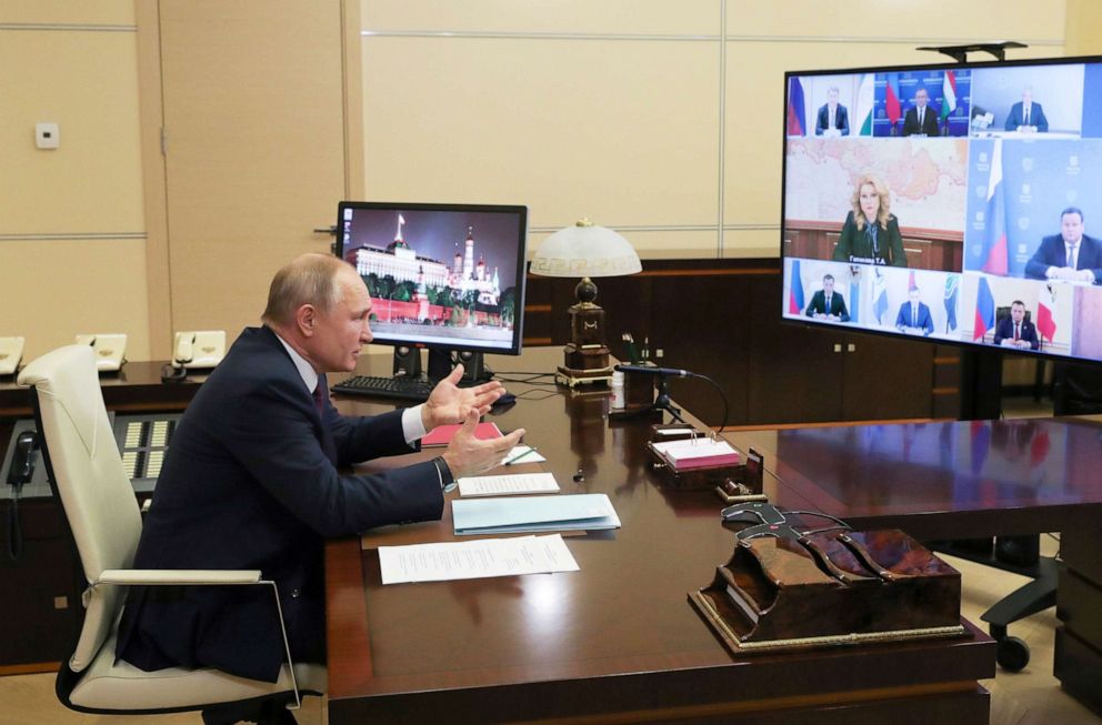 PHOTO: Russian President Vladimir Putin takes part in a meeting via a video link at the state residence outside Moscow, Jan. 5, 2021. 