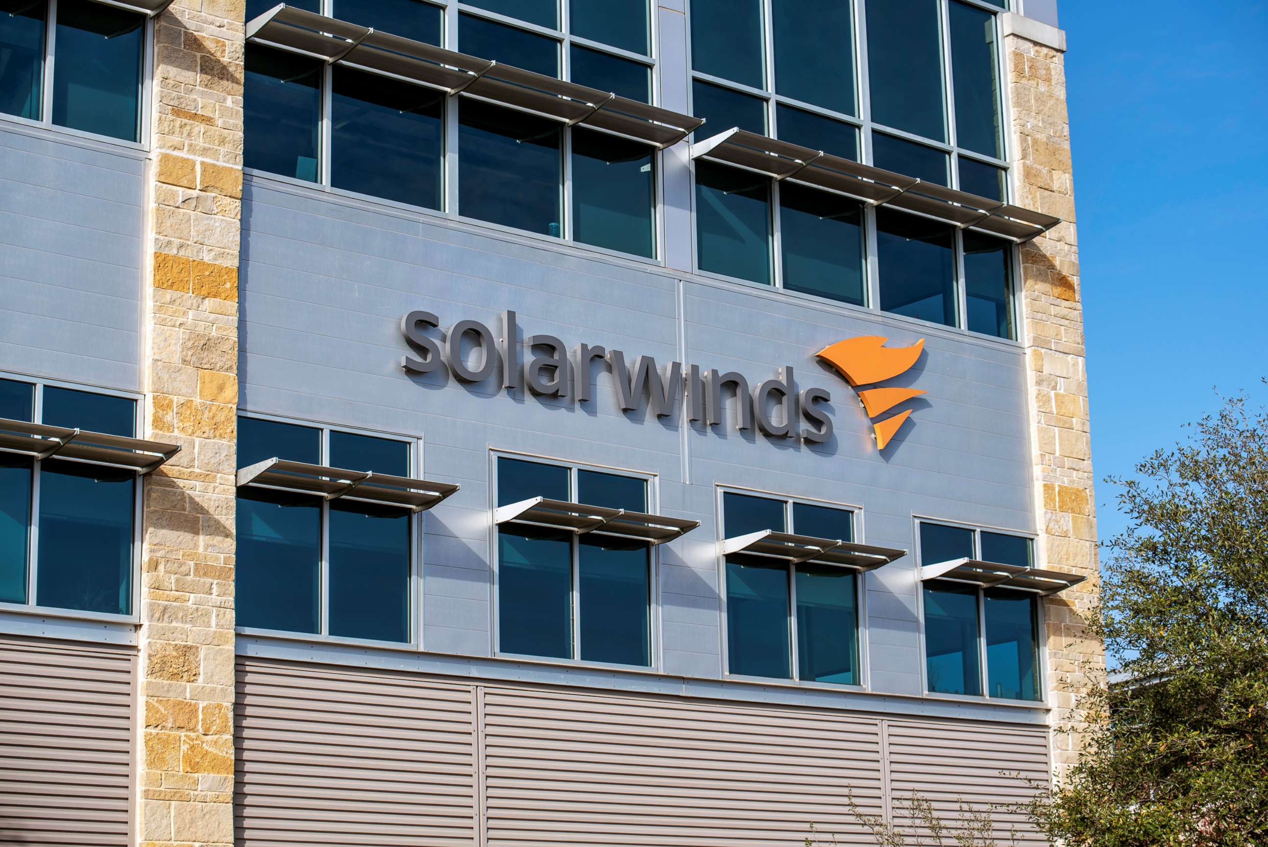 PHOTO: In this Dec. 18, 2020, file photo, the SolarWinds logo is seen outside its headquarters in Austin, Texas.