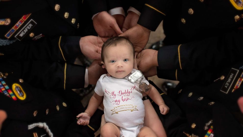 PHOTO: Christian Harris, the daughter of Army Specialist Chris Harris who was killed last year, took part in a special photo shoot with some of Harris' former comrades.