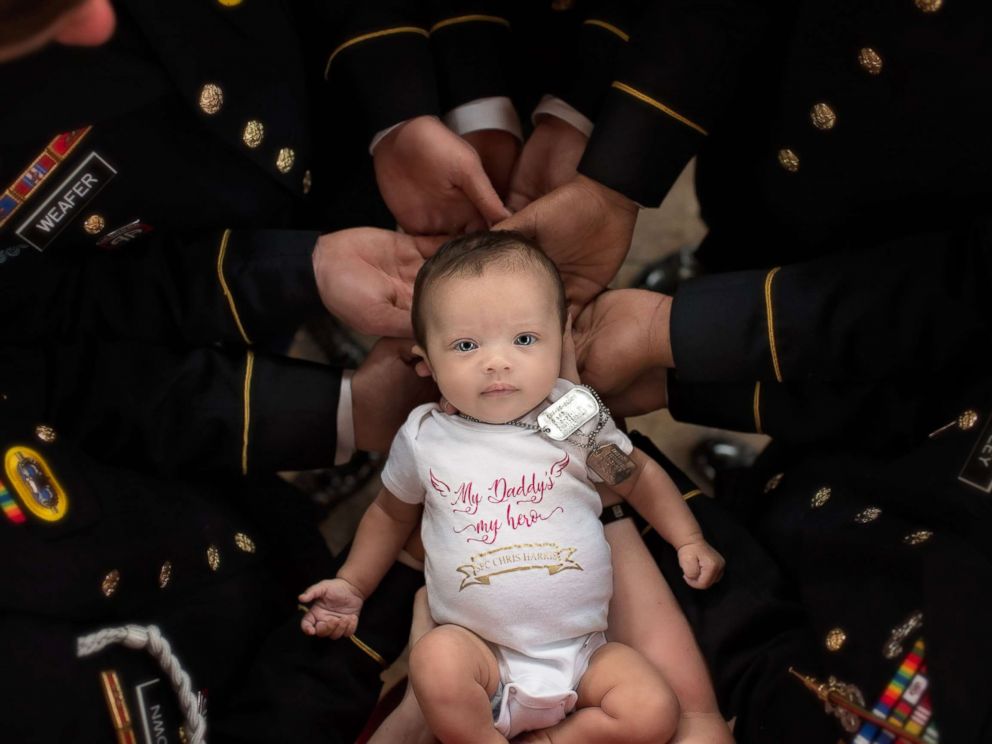 PHOTO: Christian Harris, the daughter of Army Specialist Chris Harris who was killed last year, took part in a special photo shoot with some of Harris former comrades.