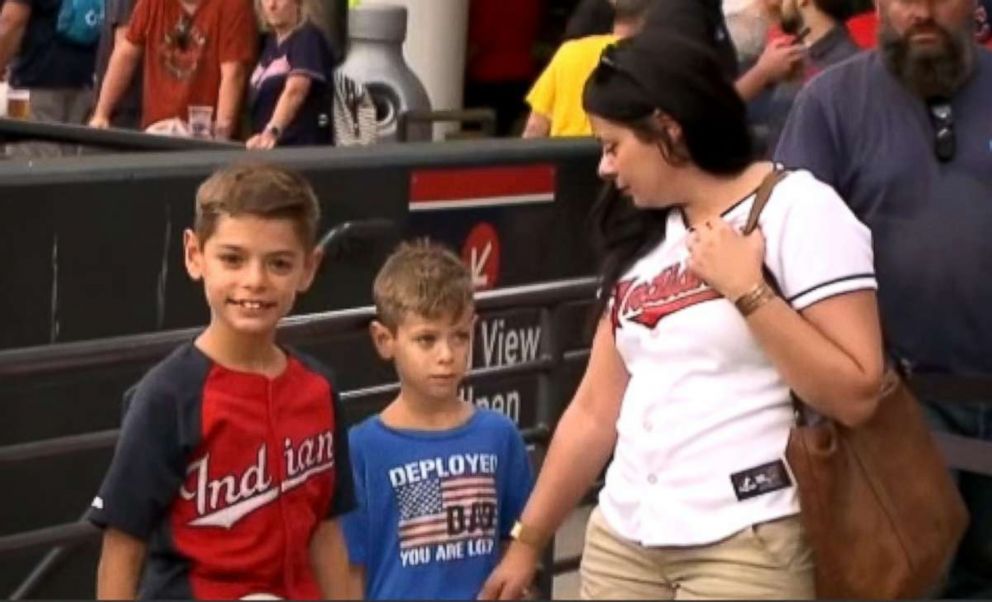 PHOTO: Sasha and Jonah Lieb were reunited with their father, U.S. Coast Guard Chief Petty Officer Tim Lieb, at a Cleveland Indians game Aug. 6.