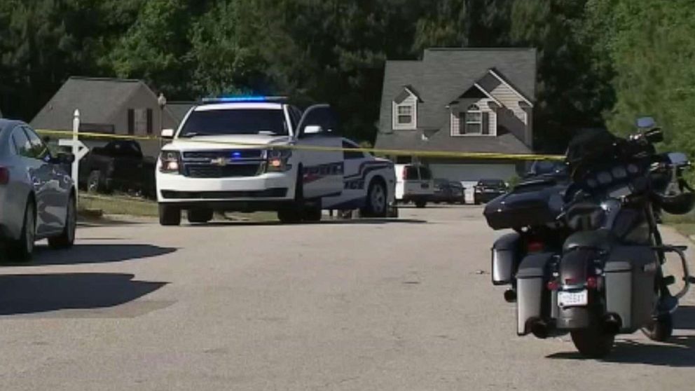 PHOTO: Police cordon off the area after an active duty Fort Bragg soldier shot another active duty soldier in broad daylight outside a Fayetteville, N.C home, May 7, 2021.