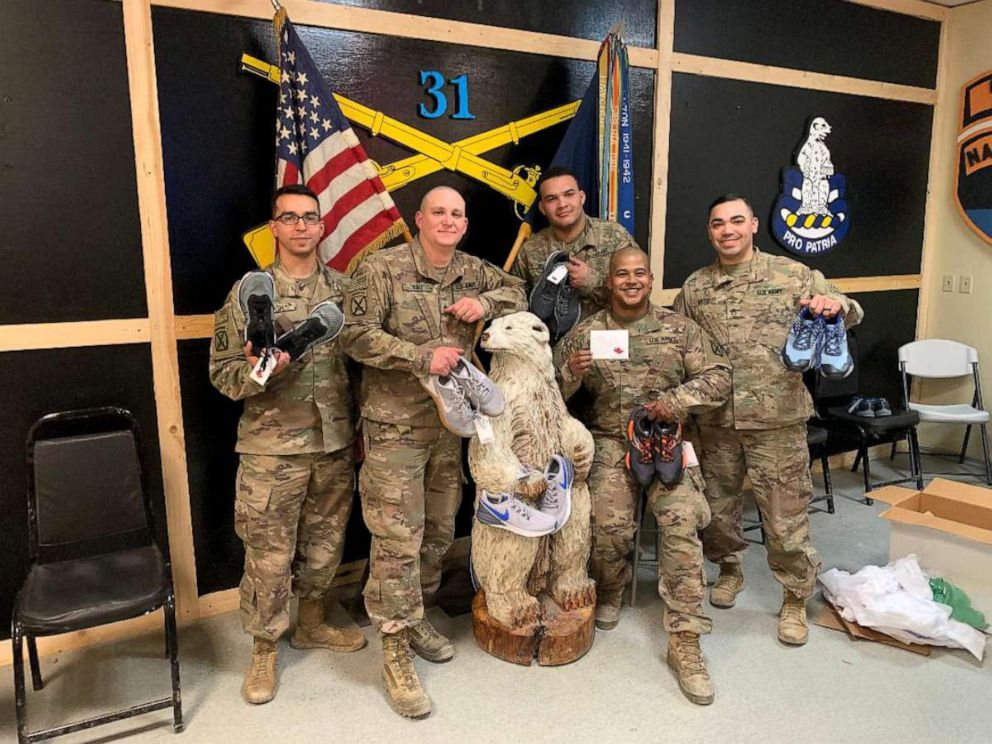 PHOTO: Soldiers pose with sneakers sent to them by Sneakers for Soldiers. Deborah Hausladen of Malvern, Pennsylvania, started the nonprofit Sneakers for Soldiers in April 2018 to collect and send shoes to soldiers in need overseas.