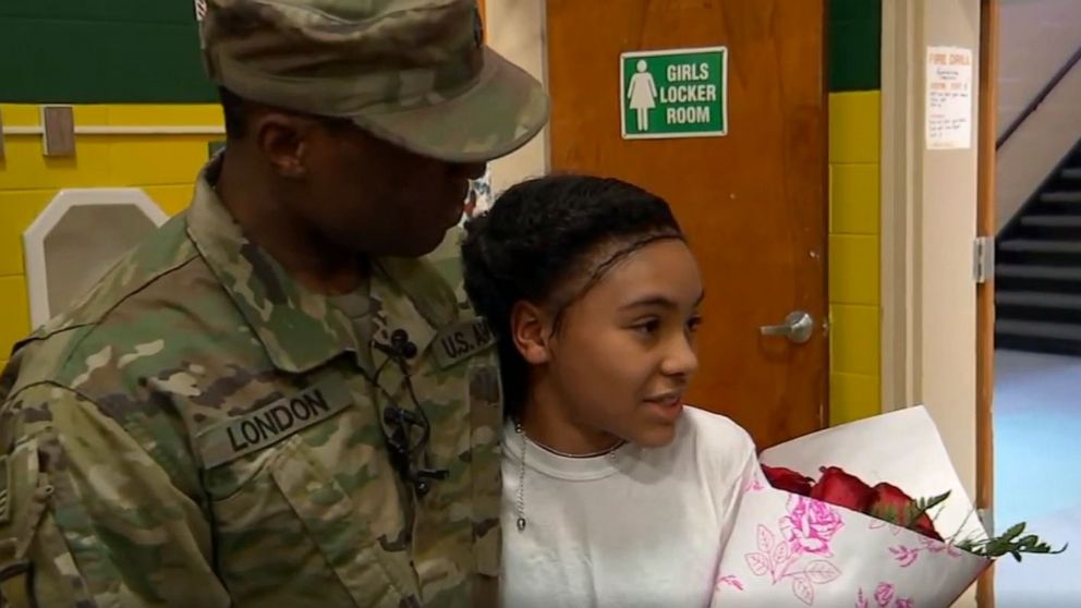 PHOTO: Alexus London, 10, was in gym class at William Rall Elementary School in Lindenhurst on Friday afternoon when her father, Army Staff Sergeant Daniel London, walked in carrying flowers.