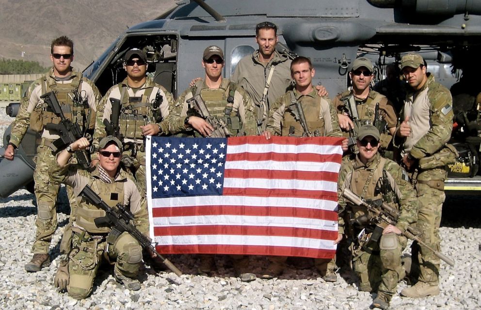 PHOTO: Master Sgt. Roger Sparks, center, and his team of pararescuemen departing Forward Operating Base Joyce at the conclusion of Operation Bulldog Bite, in Kunar Province, Afghanistan, in November 2010.