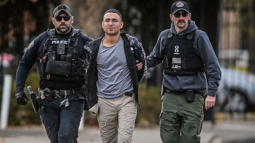 PHOTO: Solomon Peña, Republican Candidate for New Mexico House District 14, being taken into custody by APD police officers in SW Albuquerque, N.M., on Jan. 16, 2023.
