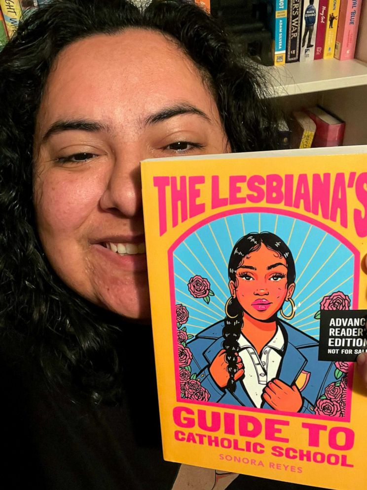 PHOTO: Author Sonora Reyes poses with her book " The Lesbiana's Guide to Catholic School."
