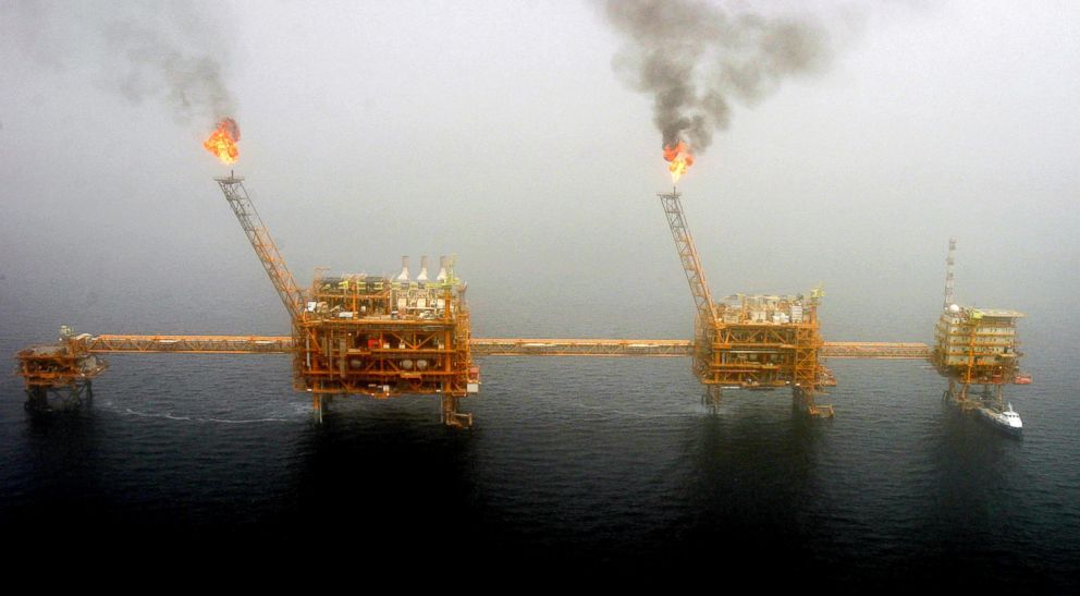 PHOTO: Gas flares from an oil production platform at the Soroush oil fields in the Persian Gulf, south of the Tehran, Iran, July 25, 2005.