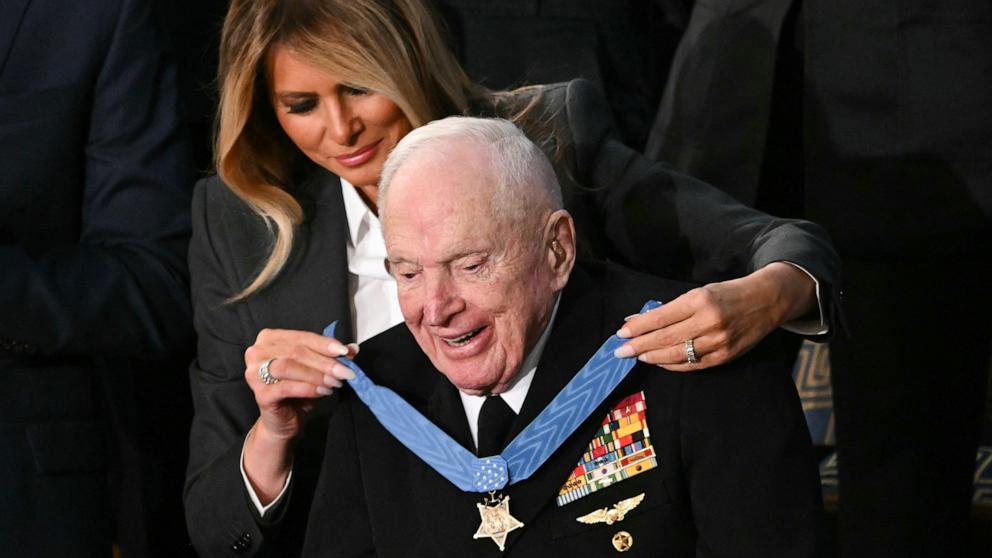 PHOTO: First Lady Melania Trump presents US veteran Captain E. Royce Williams with the Medal of Honor during US President Donald Trump's the State of the Union address in the House Chamber of the US Capitol in Washington, Feb. 24, 2026.
