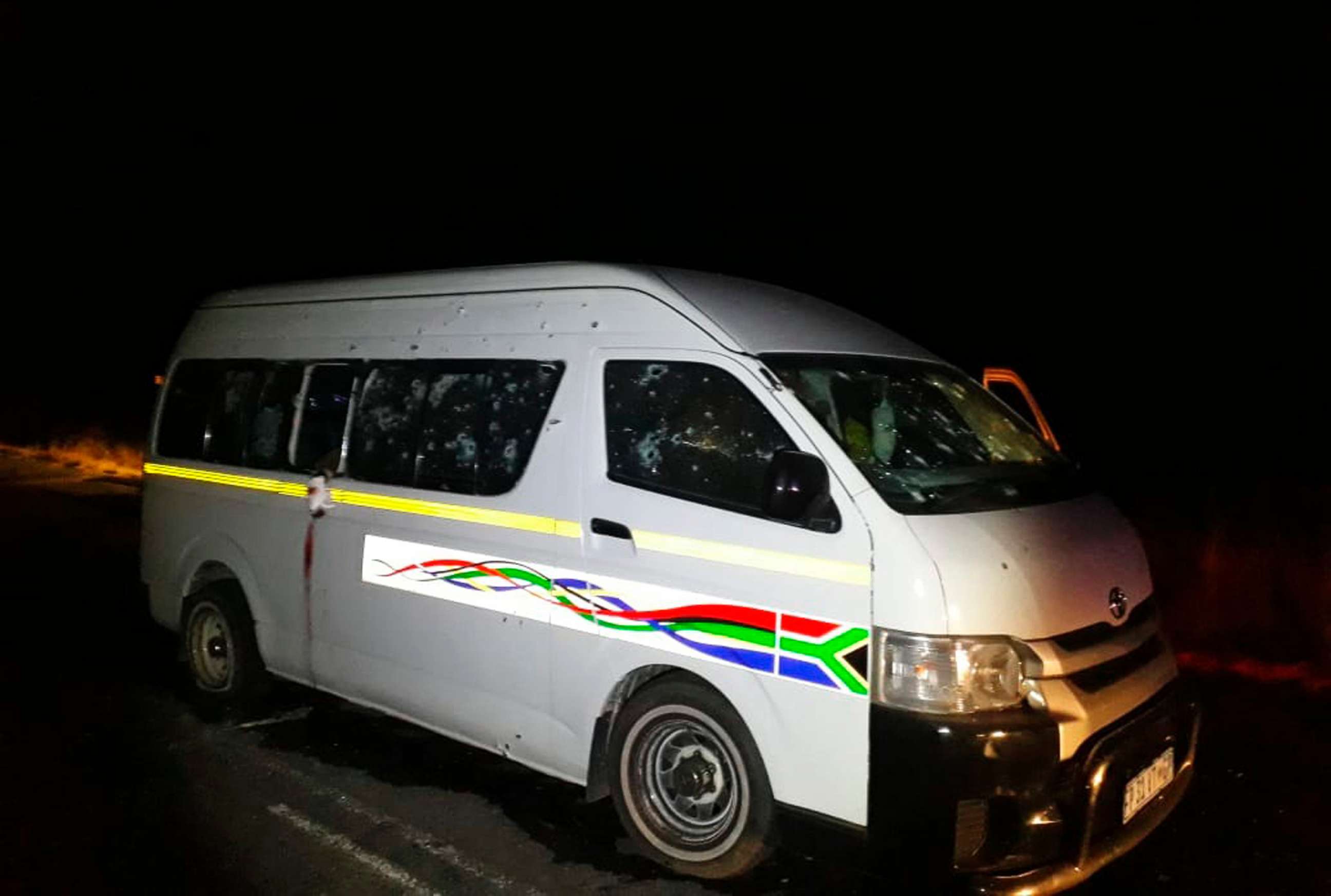 PHOTO: A minibus with bullet holes on its side is seen on the road between Weenen and Colenso, in KwaZulu Natal province, South Africa, July 22, 2018.