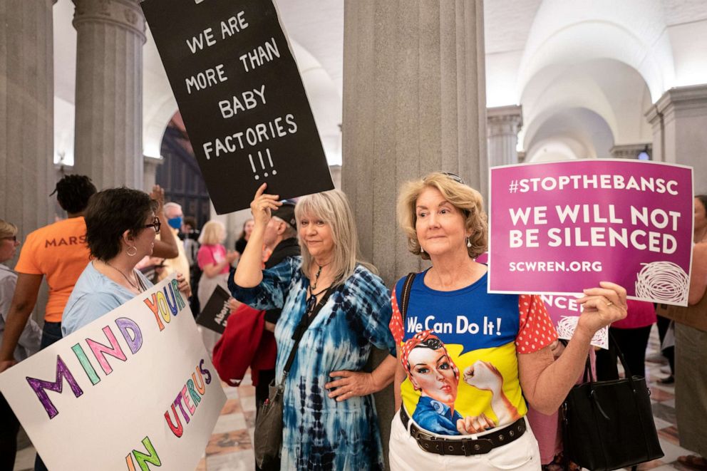 PHOTO: Abortion-rights activists wait for state lawmakers to arrive before a Senate vote on a ban on abortion after six weeks of pregnancy at the South Carolina Statehouse on May 23, 2023 in Columbia, S.C.