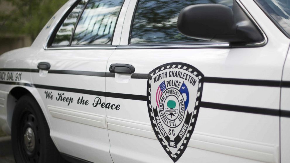 A police car is parked outside the North Charleston City Hall in North Charleston, S.C., in this April 8, 2015 file photo.