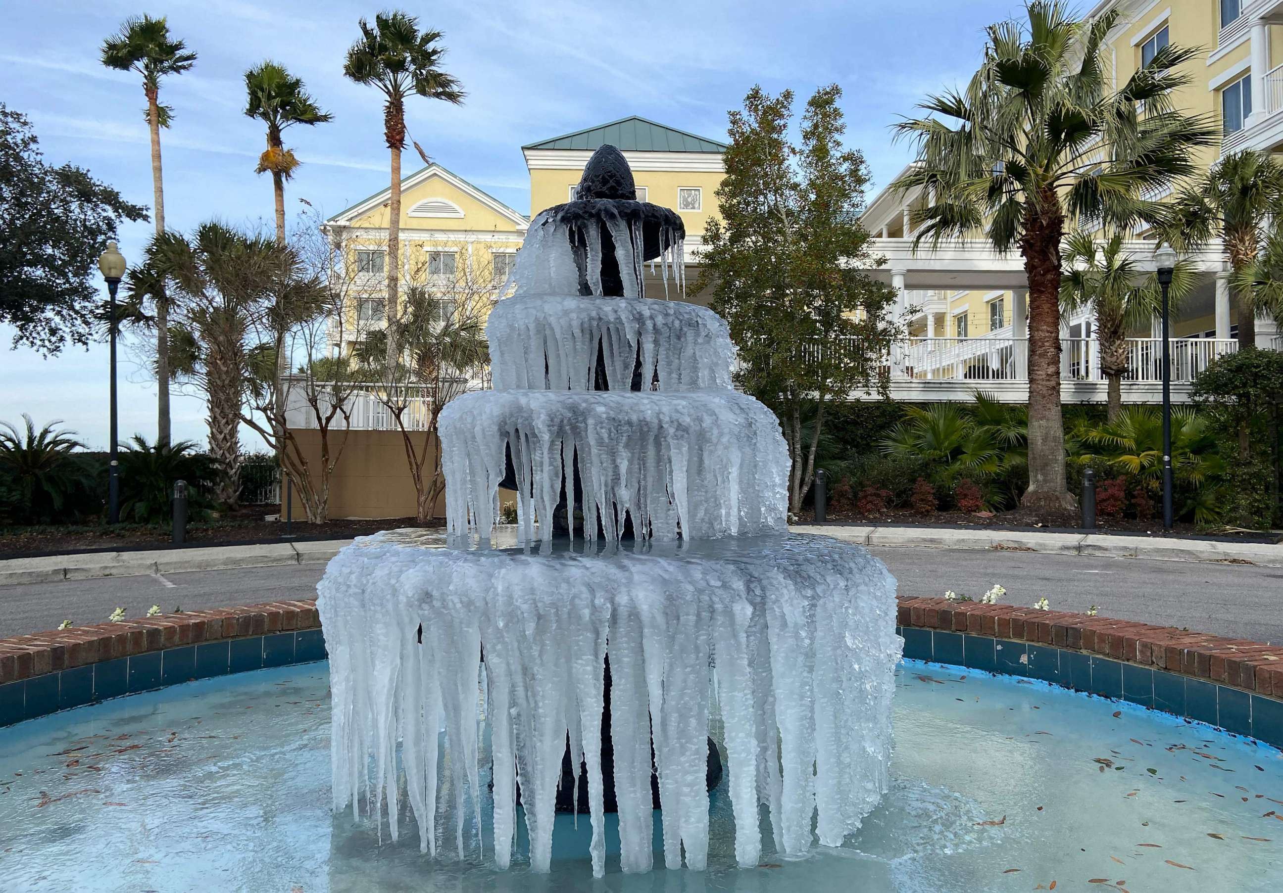 PHOTO: Ice adorns a fountain in Charleston, South Carolina, on December 24, 2022, where temperatures are forecast to reach a high of 32F.