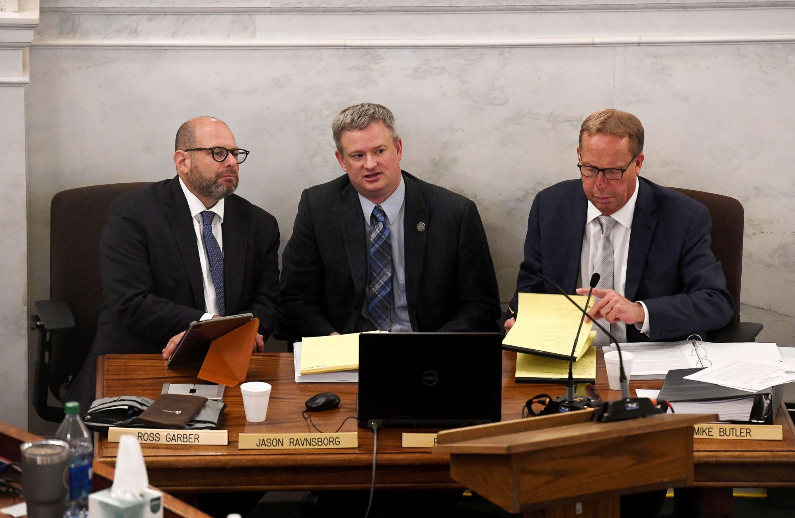 PHOTO: Attorney General Jason Ravnsborg, center, appears for the first day of his impeachment trial with lawyers Lawyers Ross Garber and Mike Butler in Pierre, S.D., June 21, 2022.