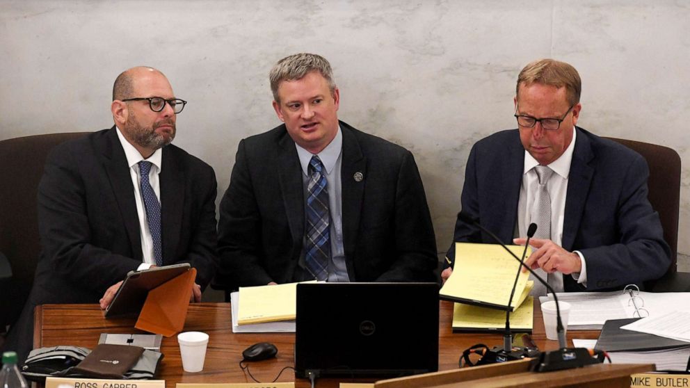 PHOTO: Attorney General Jason Ravnsborg, center, appears for the first day of his impeachment trial with lawyers Lawyers Ross Garber and Mike Butler in Pierre, S.D., June 21, 2022.