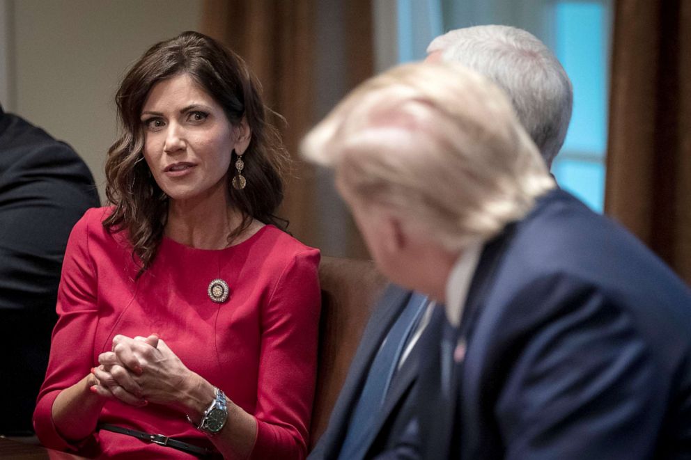 PHOTO: Governor of South Dakota Kristi Noem speaks to President Donald Trump during a meeting about the Governors Initiative on Regulatory Innovation at the White House on Dec. 16, 2019.
