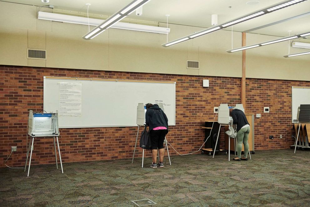 PHOTO: In this June 2, 2020, file photo, voters cast their ballot at a polling location in Sioux Falls, S.D.