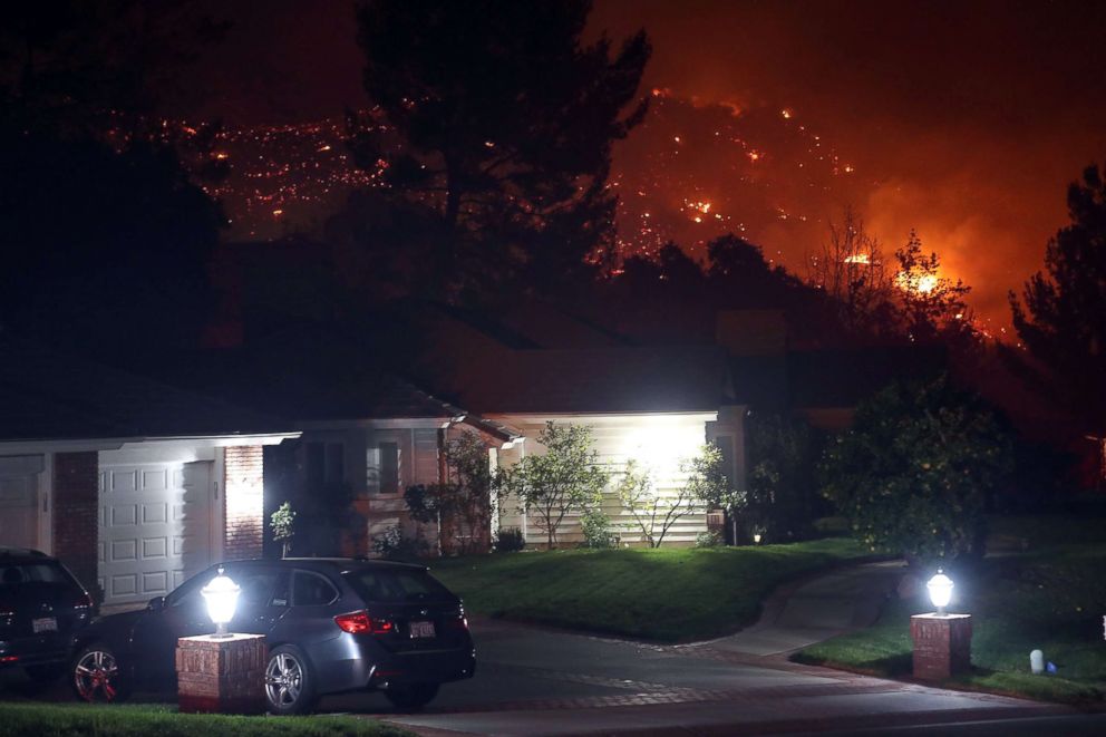 PHOTO: The Woolsey Fire burns near homes in Oak Park, Calif., Nov. 9, 2018.