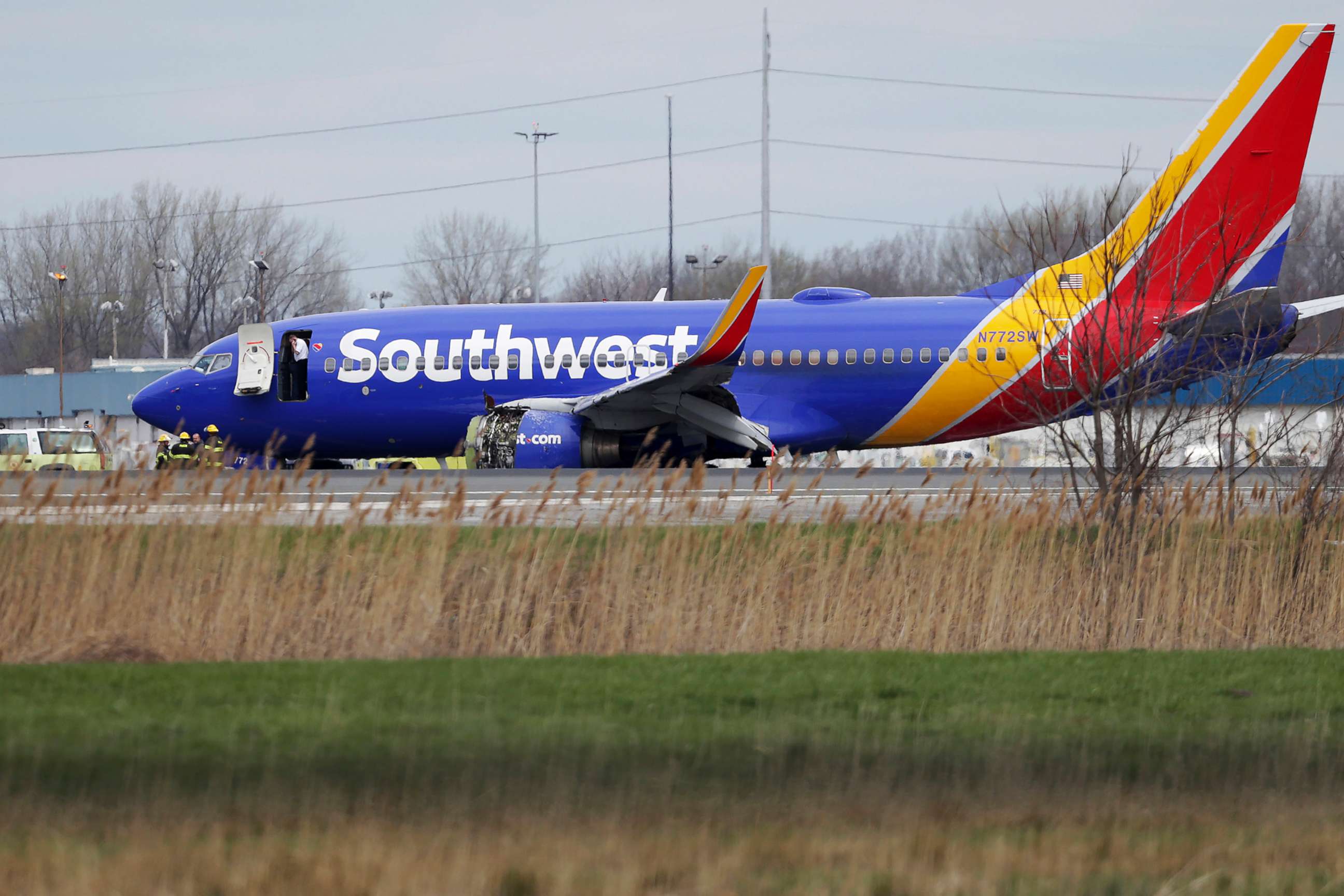 PHOTO: A Southwest Airlines plane sits on the runway at the Philadelphia International Airport after it made an emergency landing in Philadelphia, April 17, 2018.