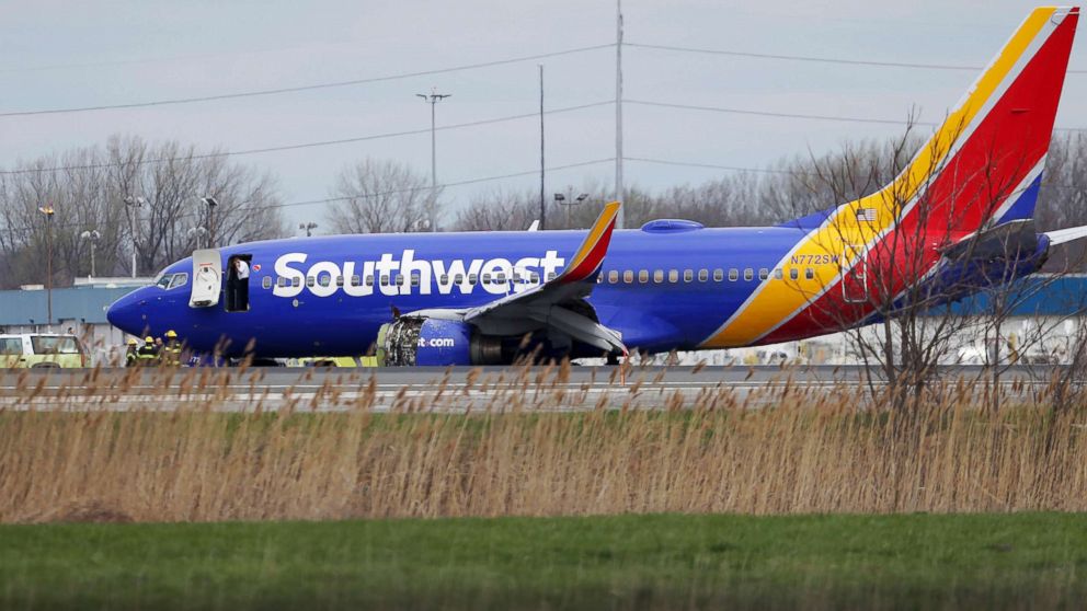 PHOTO: A Southwest Airlines plane sits on the runway at the Philadelphia International Airport after it made an emergency landing in Philadelphia, April 17, 2018.