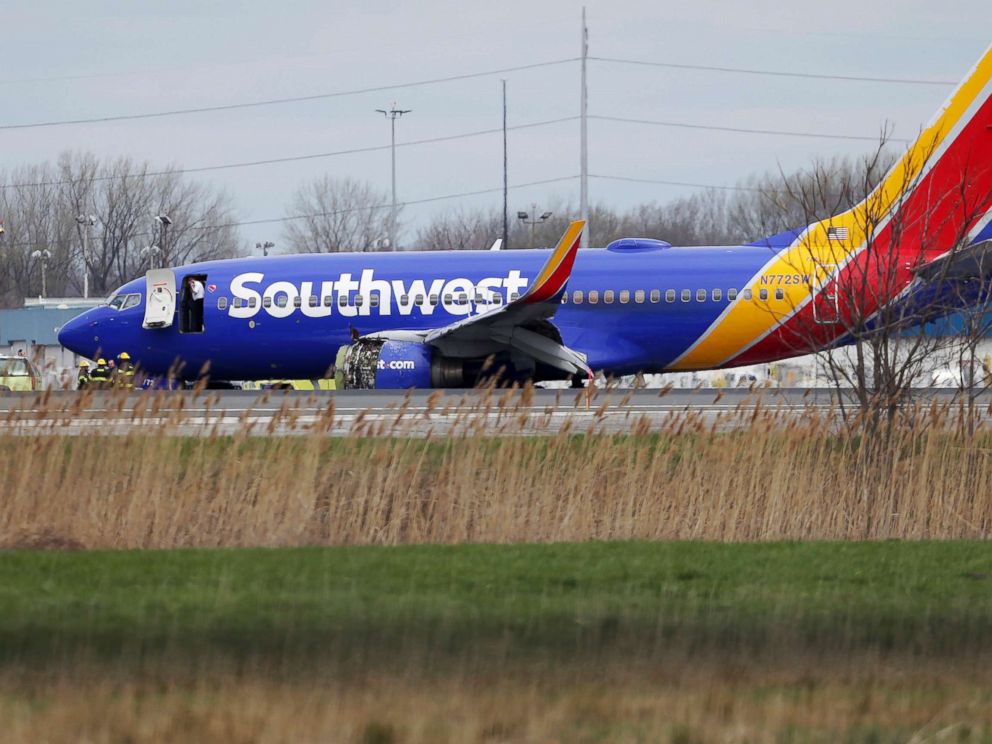 PHOTO: A Southwest Airlines plane sits on the runway at the Philadelphia International Airport after it made an emergency landing in Philadelphia, April 17, 2018.