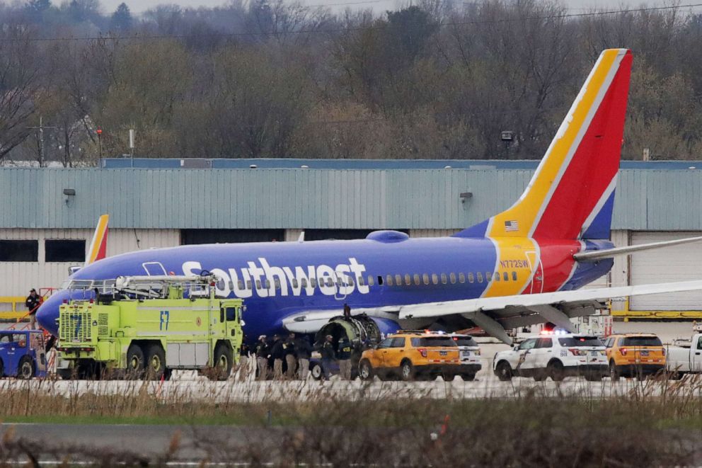 PHOTO: A Southwest Airlines jet sits on the runway at Philadelphia International Airport after it was forced to land with an engine failure, in Philadelphia, Pennsylvania, on April 17, 2018.
