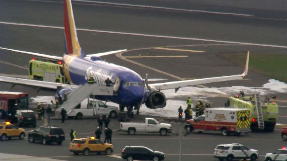 PHOTO: A Southwest Airlines plane on the tarmac at the airport in Philadelphia after making an emergency landing, April 17, 2018. 