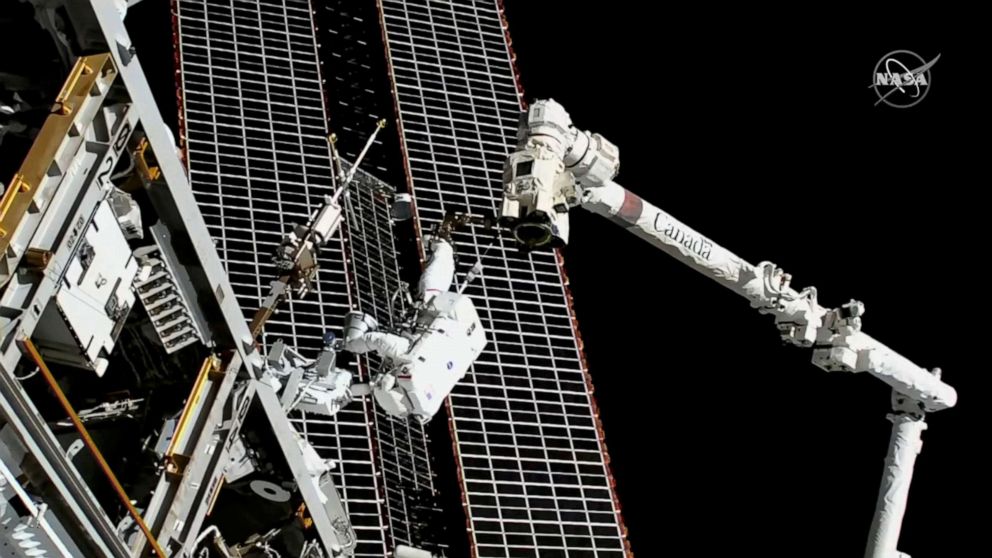 PHOTO: Astronauts conduct a spacewalk to replace a faulty antenna on the International Space Station (ISS), Dec. 2, 2021.