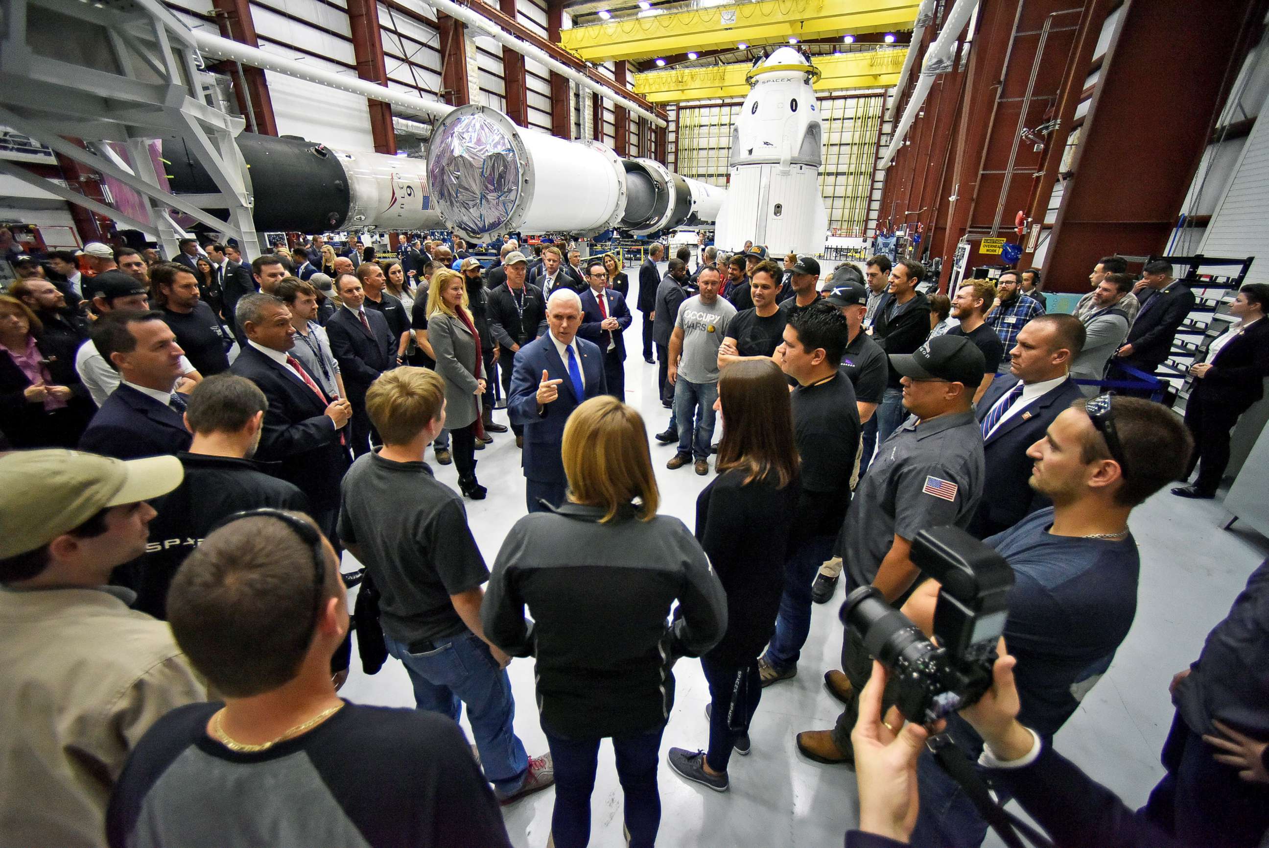 PHOTO: Vice President Mike Pence talks with SpaceX employees during a tour of the SpaceX hangar at Launch Complex 39-A in Cape Canaveral, Fla., Dec. 18, 2018.