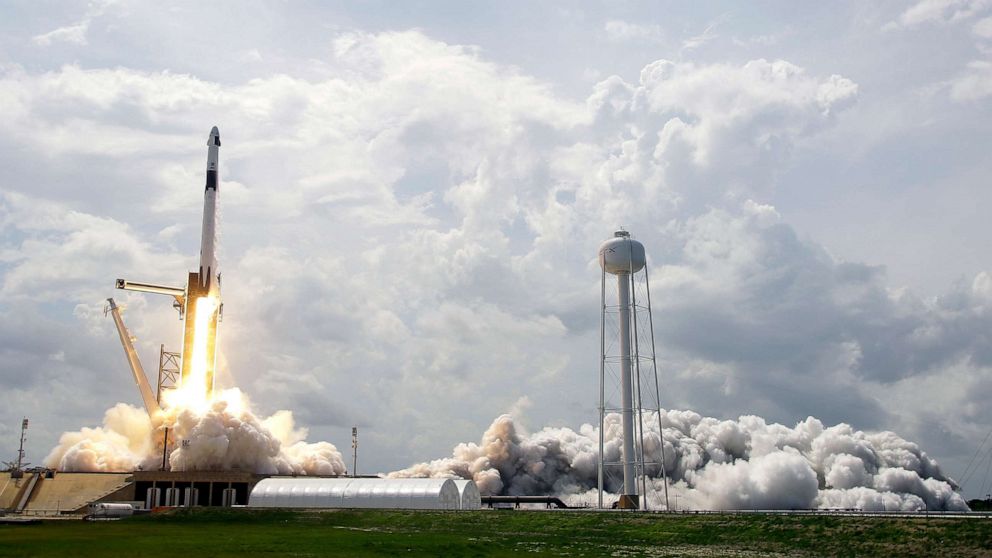 PHOTO: SpaceX Falcon 9, with NASA astronauts Doug Hurley and Bob Behnken in the Dragon crew capsule, lifts off from Pad 39-A at the Kennedy Space Center in Cape Canaveral, Fla., May 30, 2020.