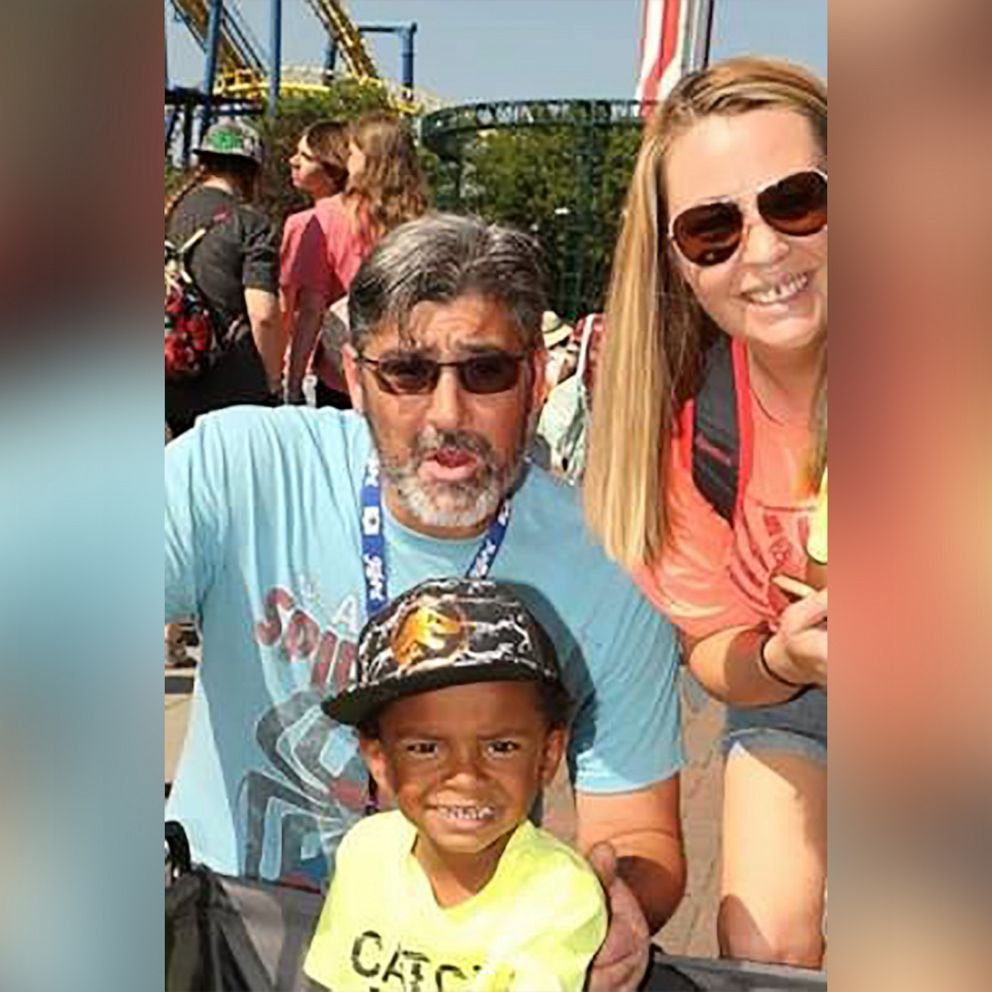 PHOTO: Michael and Jennifer Spaetti of Salisbury, N.C., pose in an undated photo with their 6-year-old grandson whom they care for.