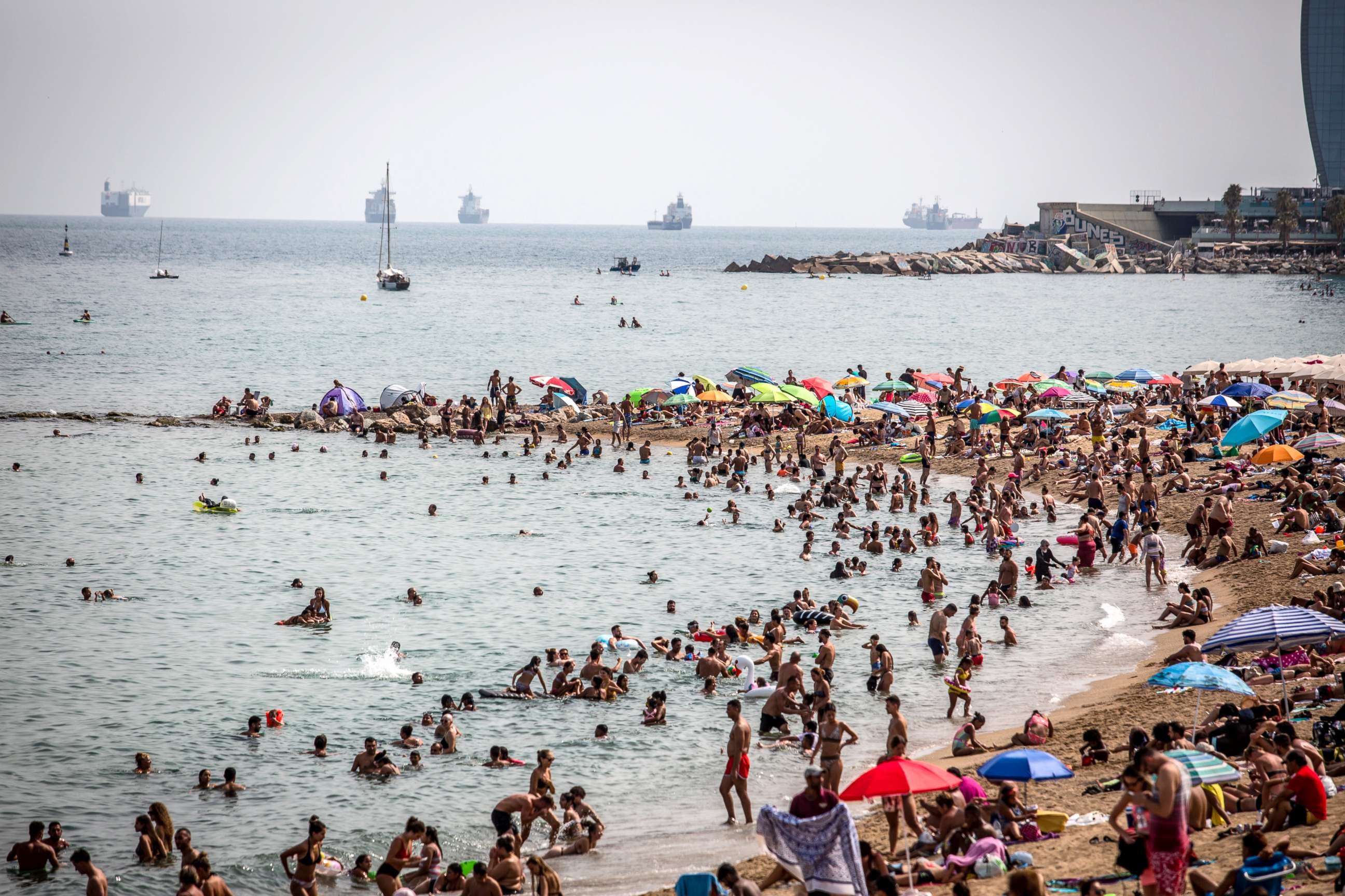 PHOTO: Beachgoers at Barceloneta beach in Barcelona, Spain, Aug. 15, 2021. 