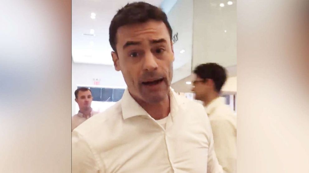 PHOTO: An image made from video shared to social media on May 15, 2018 shows Aaron Schlossberg threatening to call ICE on people who spoke Spanish in a restaurant in New York.