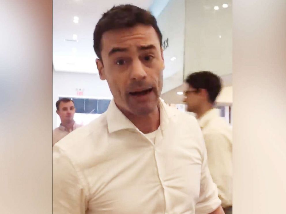 PHOTO: An image made from video shared to social media on May 15, 2018 shows Aaron Schlossberg threatening to call ICE on people who spoke Spanish in a restaurant in New York.
