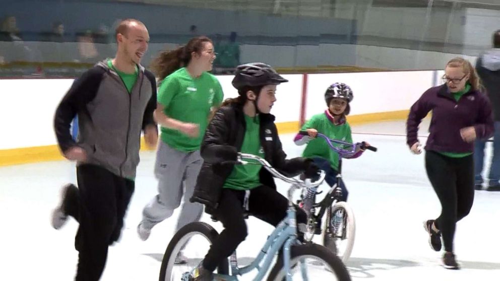 PHOTO: Kids participate in a week-long bike camp run by Emerson Hospital in Groton, Mass., teaching children with special needs to ride bikes, April 2018.