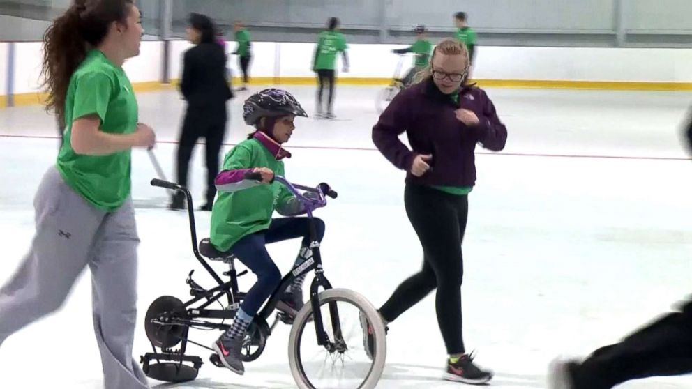 PHOTO: Kids participate in a week-long bike camp run by Emerson Hospital in Groton, Mass., teaching children with special needs to ride bikes, April 2018.