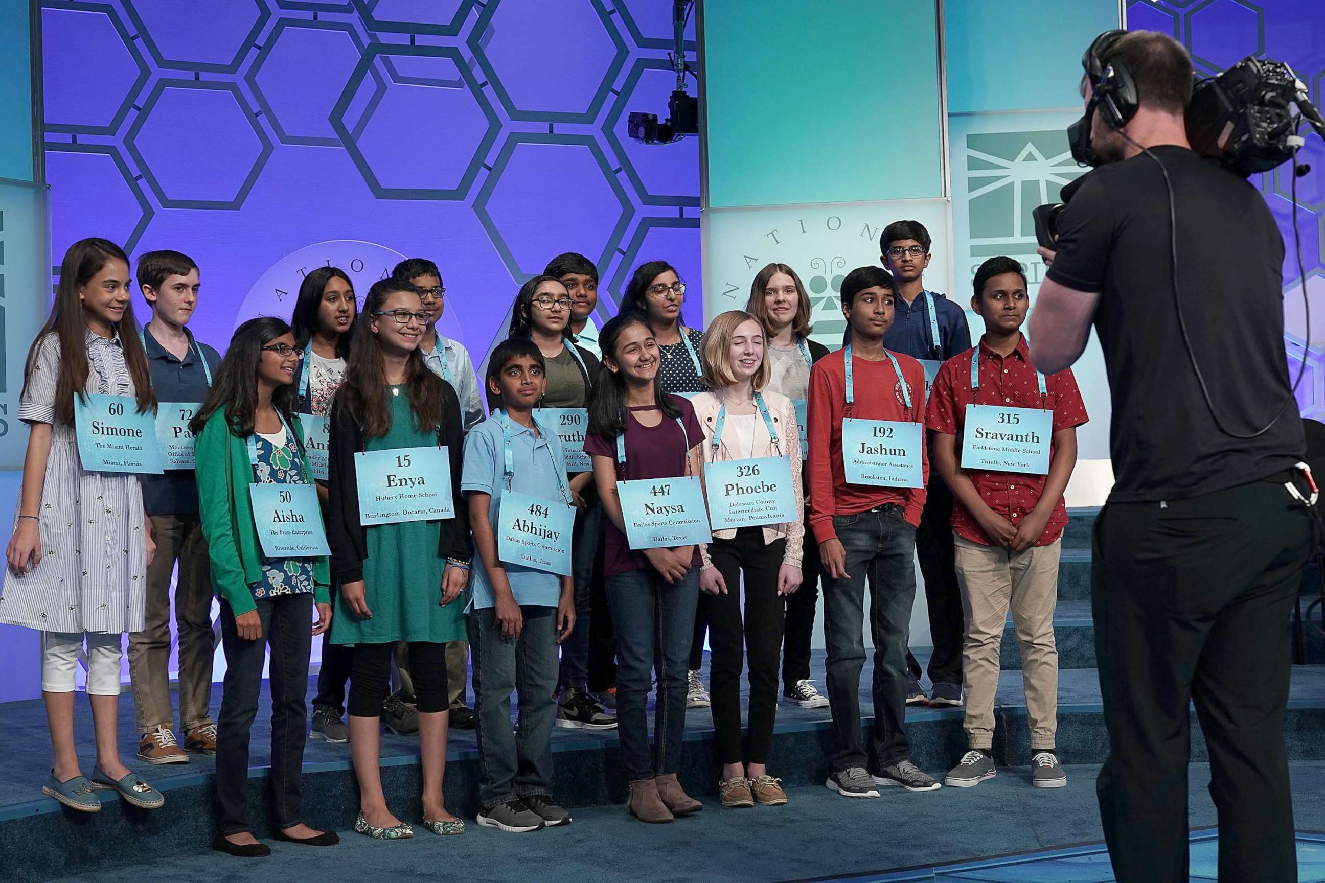 PHOTO: Spellers who have advanced to the evening round pose for a group picture after round eight of the 91st Scripps National Spelling Bee at the Gaylord National Resort and Convention Center May 31, 2018 in National Harbor, Maryland.