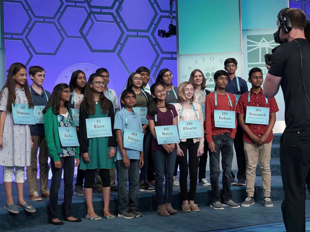 PHOTO: Spellers who have advanced to the evening round pose for a group picture after round eight of the 91st Scripps National Spelling Bee at the Gaylord National Resort and Convention Center May 31, 2018 in National Harbor, Maryland.
