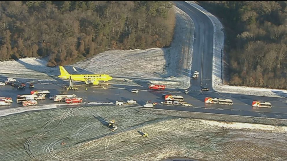 PHOTO: Spirit Airlines flight 696 from Las Vegas sits after sliding partially off the taxiway at Baltimore/Washington International Thurgood Marshall Airport in Maryland early on Dec. 17, 2020.