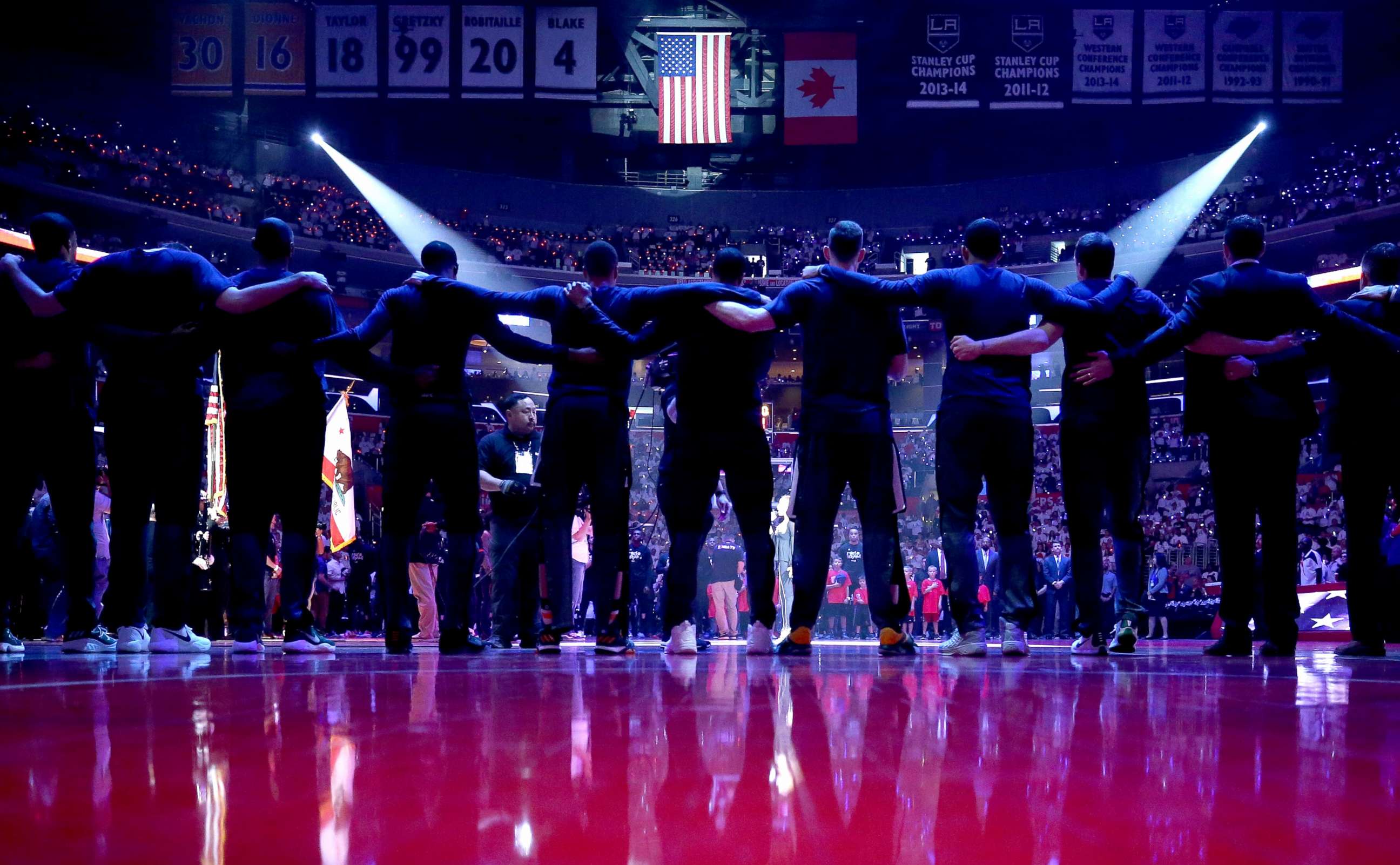 PHOTO: The Utah Jazz stand together during the national anthem prior to Game Seven of the Western Conference Quarterfinals against the Los Angeles Clippers at the Staples Center, April 30, 2017, in Los Angeles.