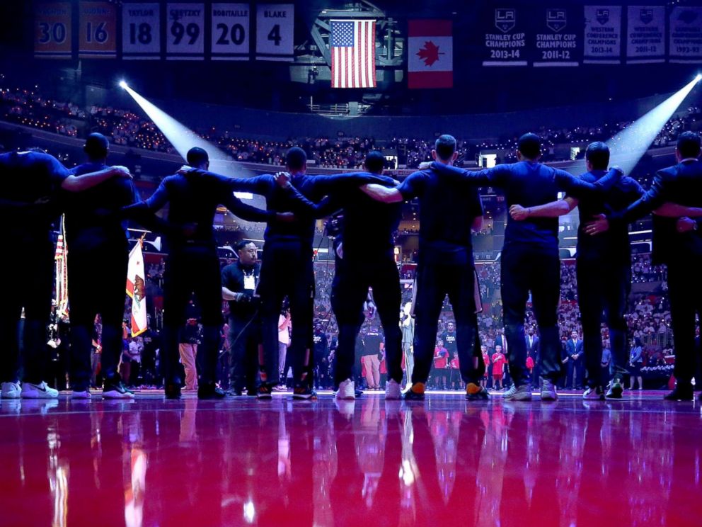 PHOTO: The Utah Jazz stand together during the national anthem prior to Game Seven of the Western Conference Quarterfinals against the Los Angeles Clippers at the Staples Center, April 30, 2017, in Los Angeles.