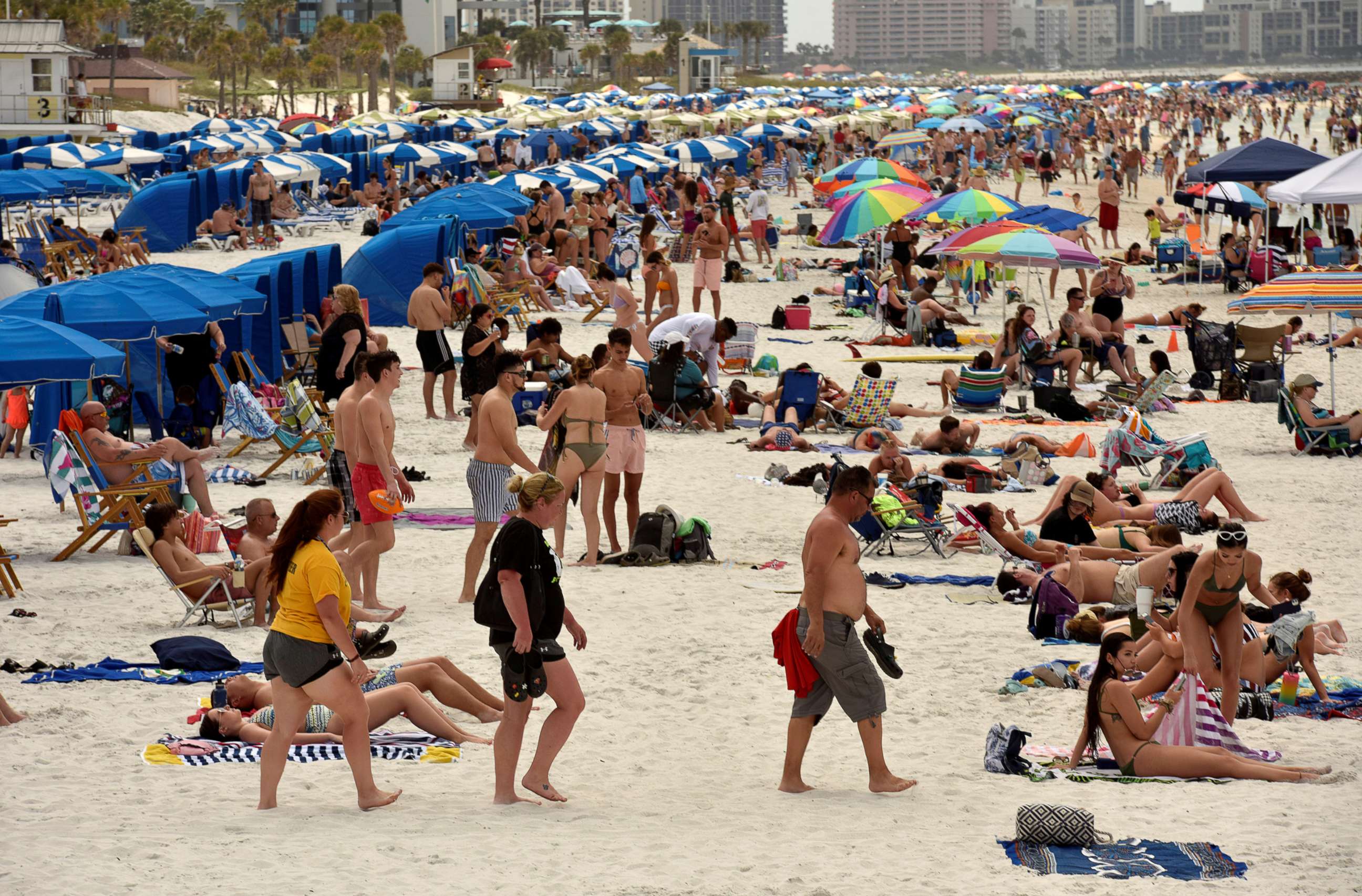 PHOTO: In this March 17, 2020, file photo, people crowd the beach in Clearwater, Fla.