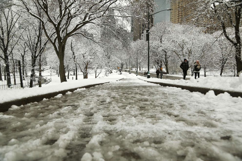 PHOTO:Slush and ice coat the pathways in Central Park after an early spring storm on April 2, 2018 in New York.