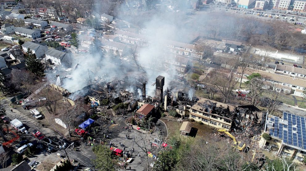 PHOTO: Firefighters work on extinguishing hotspots from a fire that burned down the Evergreen Court Home for Adults, March 23, 2021, in Spring Valley, N.Y.