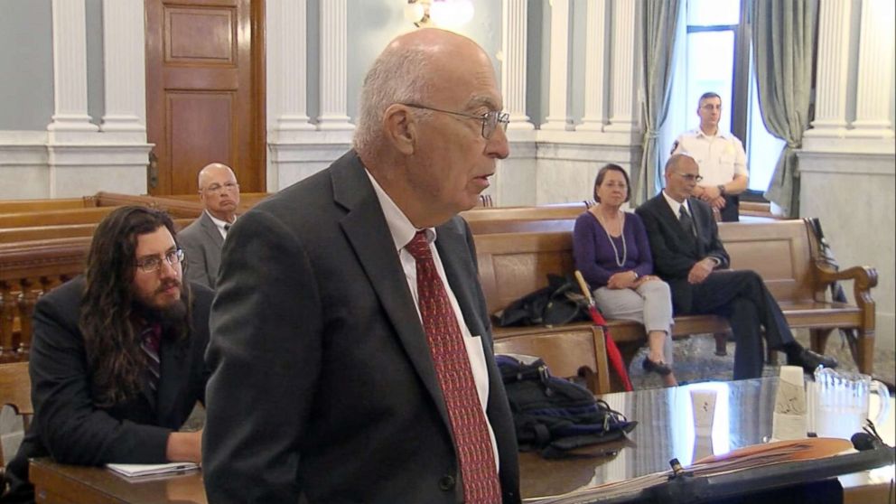 PHOTO: Michael Rotondo, left, sits in a New York State Supreme Court as his parents' attorney petitions the judge to order him to move out of their home.