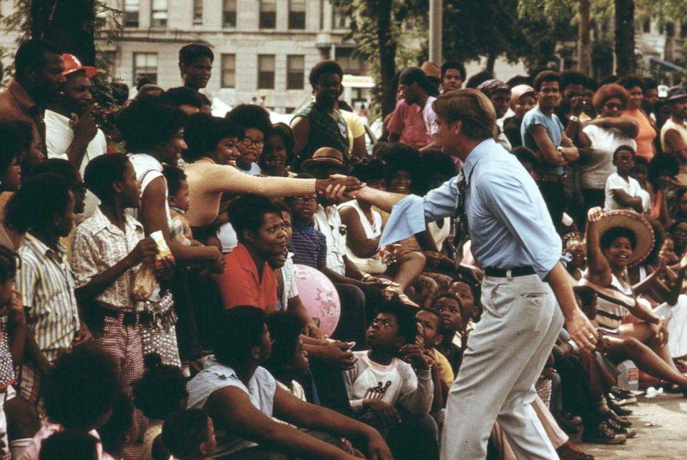 PHOTO: Illinois Governor Dan Walker greets Chicago constituents during the Bud Billiken Day parade, in Chicago, 1973. 