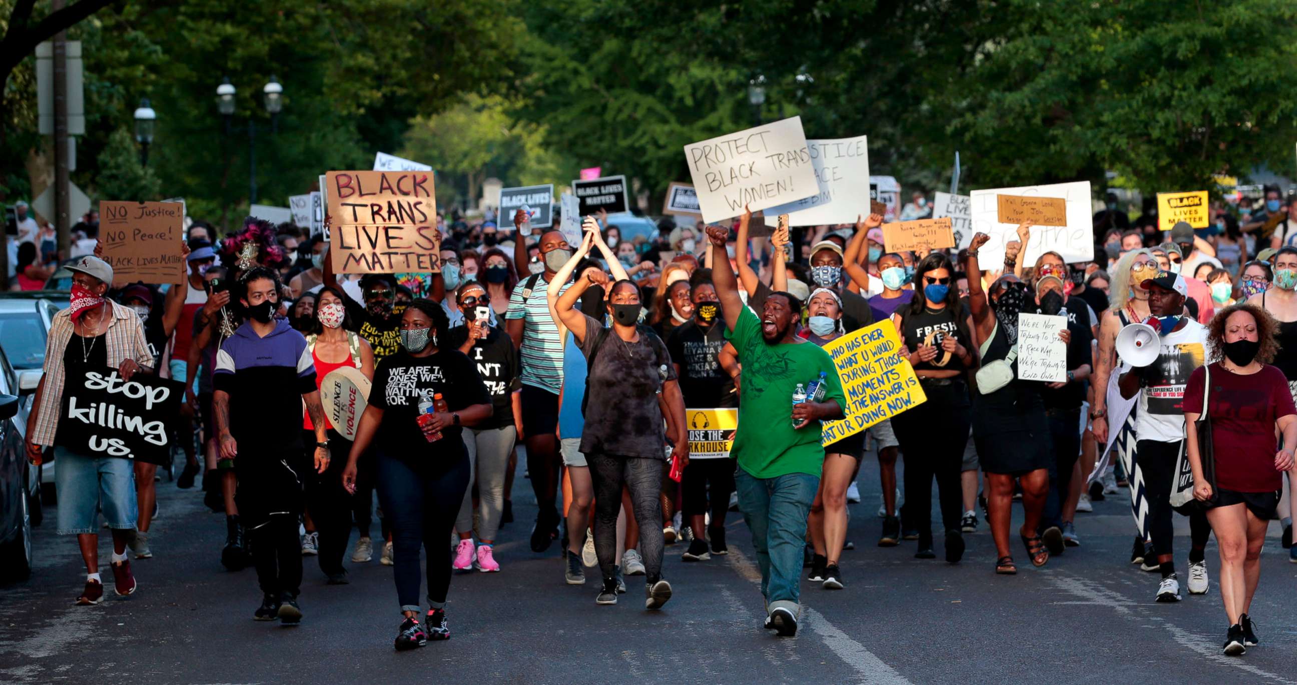 PHOTO: Hundreds of protesters march down Waterman Boulevard headed to St. Louis Mayor Lyda Krewson's home on June 28, 2020, in St. Louis.
