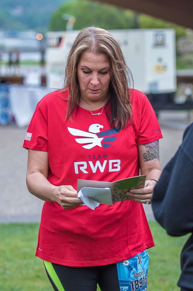 PHOTO: Stacey Faix reads card her biological son wrote to her before she looks up and sees him.